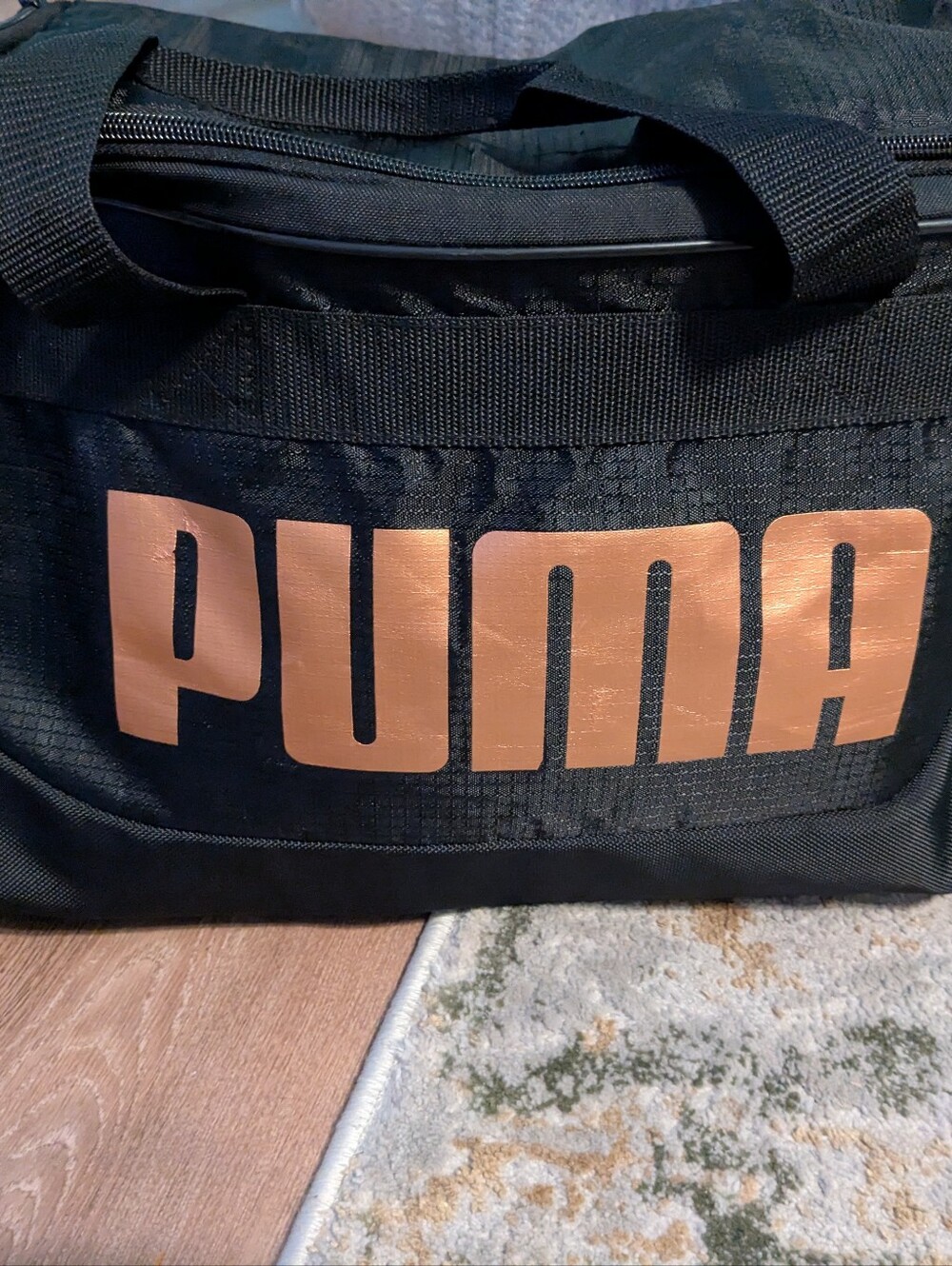 Puma Black Duffel Bag with Metallic Copper Logo